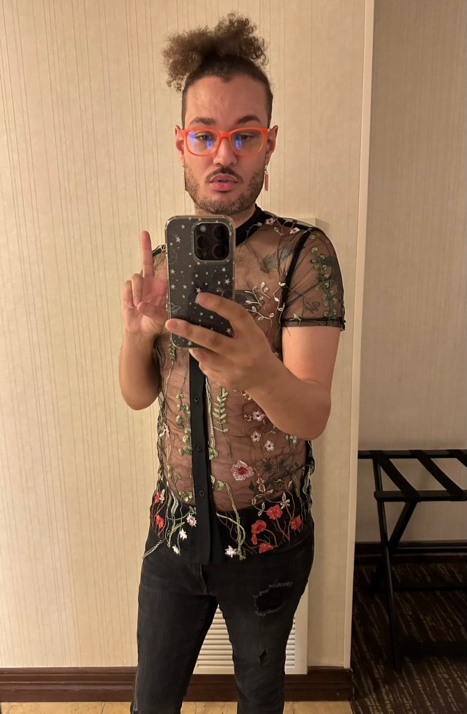 Kevie The Dreamer preparing for the day during Podcast Movement Dallas 2025.