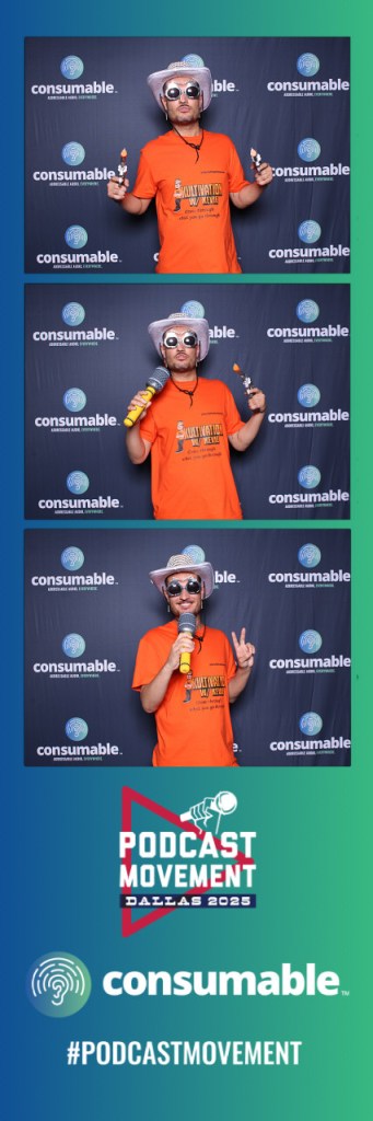 Kevie The Dreamer posing in a themed photobooth at Podcast Movement Dallas 2025.