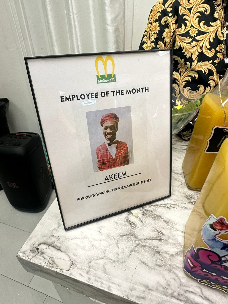 McDowell's Employee of the Month display inspired by Coming to America at Prince Elijah's baby shower.